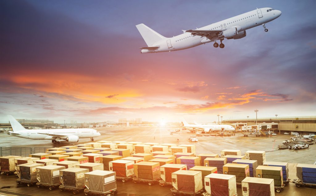 cargo,containers,waiting,load,into,an,airliner